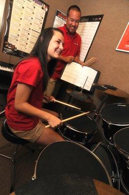 My daughter Julianna taking a drum lesson at the school