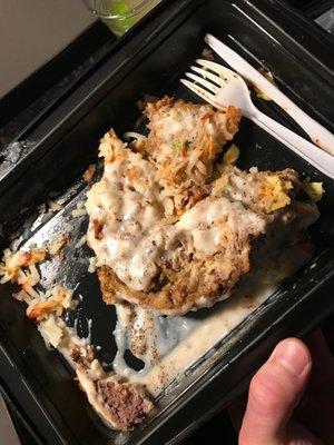 What even is this?   Was supposed to be Chicken fried steak. Ordered takeout Food came cold. Gross.