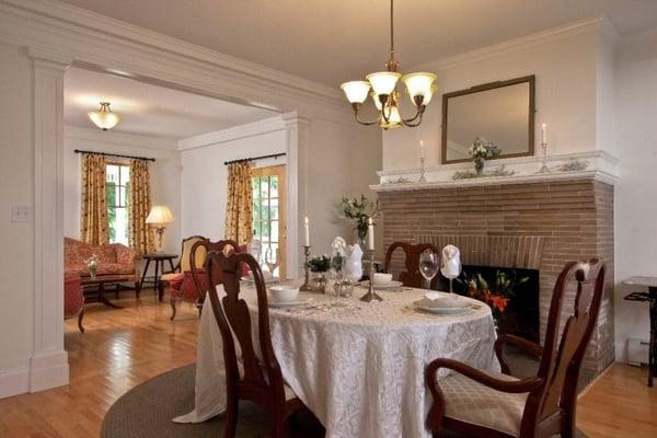 Dining room with cranberry and ochre parlor in the background.