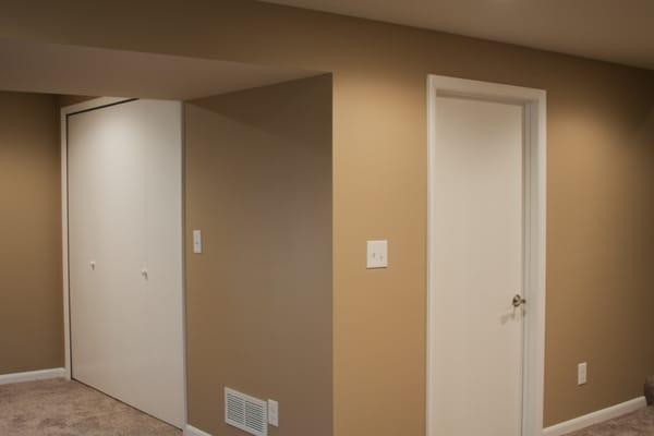 I framed all of the walls, painted, installed the trim and doors shown here.