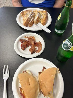 Bacon, egg, and cheese on a toasted roll.  Bacon  Challah French toast