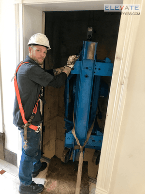 Removing old equipment and extending elevator to roof top!