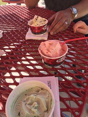 Banana chocolate chip, strawberry, and mint chip ice cream.