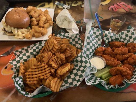 Mac and cheese burger, tots, waffle fries and boneless buffalo wings. All really good!