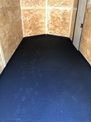 Enclosed trailer floor after spray on Bullet Liner