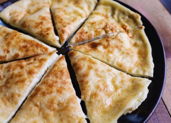 Imeruli Khachapuri - Georgian Bread filled with a cheese.