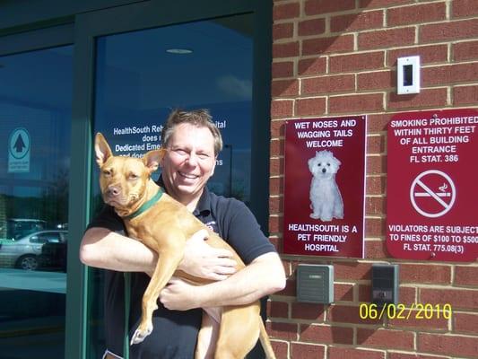 Tom and his dog Pippi, volunteering at HealthSouth Rehabilitation Hospital in Sarasota.