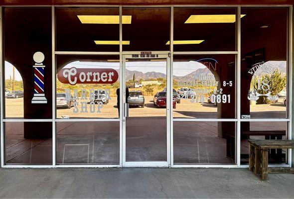 The Corner Barber Shop. Open 8-5, Tuesday through Saturday, with "Men Only Haircut Specials" on Wednesday.