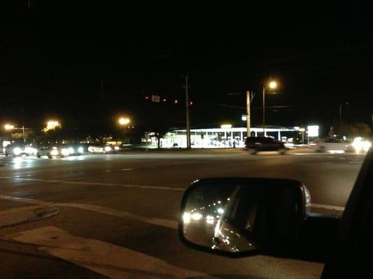 There are some trees that can block the sign. It is attached to the gas station. Across the street from the Perkins.