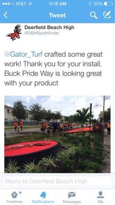 Installation of logos at DeerField Beach High School.