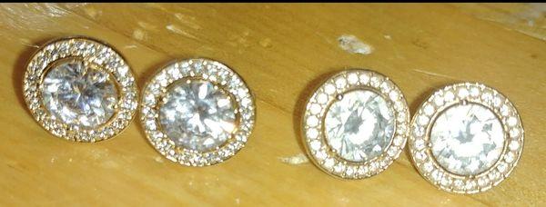 On the left are my earrings that are clear and pretty. On the right are the earrings she got makeup in them and are now cloudy in real life.