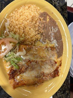 Chicken and cheese enchilada plate with beans and rice