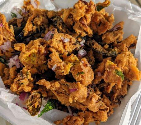 Inedible rock-hard pakora - all batter, no veggies and so hard you can't chew them