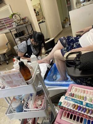 My mom and I both getting pedicures