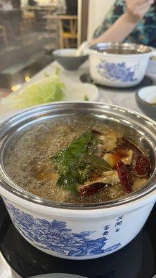 My Szechuan broth boiling w/ the ingredients added