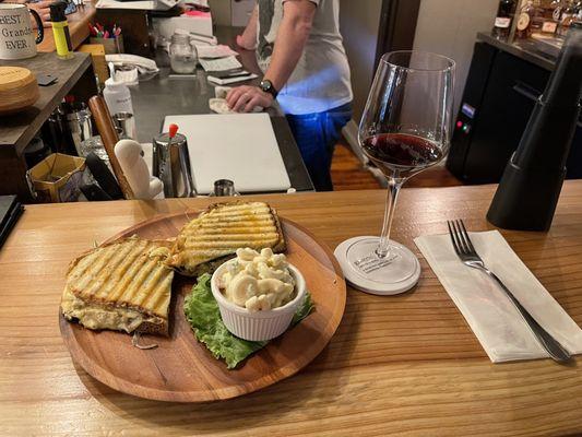 A nice Cab, a panini and macaroni salad.