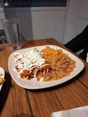 Chicken enchiladas with those melt -in-your-mouth beans