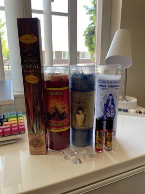 Candles, copal incense, oils, crystals