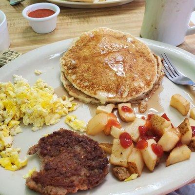 My 2 pancakes, sausage patty, fried square potatoes & eggs plus great tasting coffee. Service was great ! Good breakfast spot !