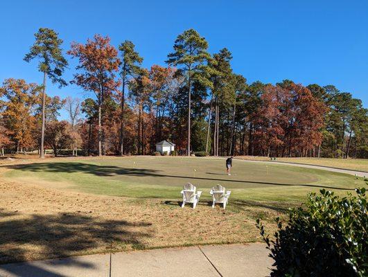 View of practice putting green from clubhouse patio.