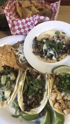 Carna asada plate n a chicken taco