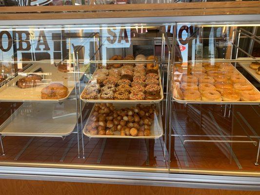 Donut selection at noon on a sunday