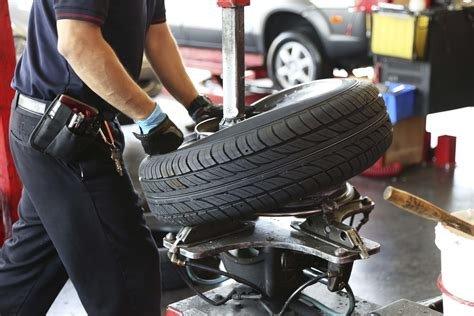 Mounting new tires on wheel at S&S Tire and Auto Services