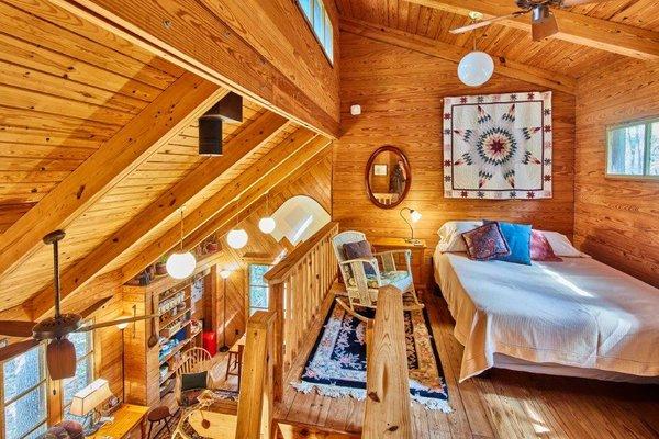 Cabin Loft with queen bed & kid size futon. Access via ladder.