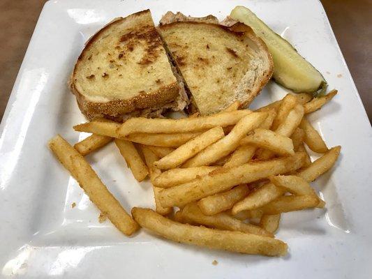 Tuna melt with french fries.