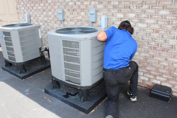 Technician working on HVAC Tune-up