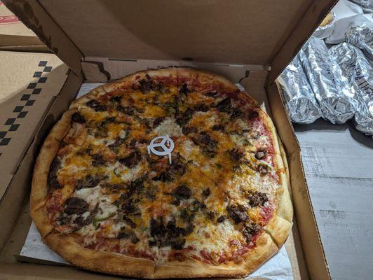 A cheese steak on a pizza. Yes, please.