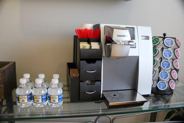 Our reception area features Keurig coffee, tea, and hot chocolate, bottled water, and granola bars.