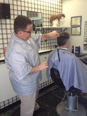 Giving a haircut.