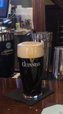 Warm, poorly poured, Guinness