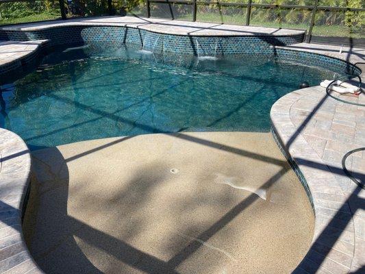 Beach area is "Sandy Beach".  The rest of the pool is "Midnight Blue".