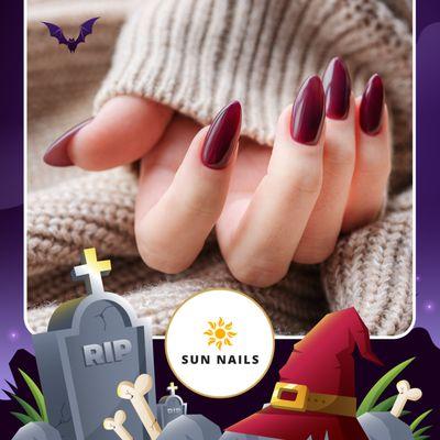 Elegance Meets Spookiness: Experience Exceptional Halloween Nail Art at our Luxurious Salon!