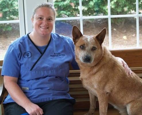 Kristen, one of our veterinary technicians, with her dog Mader.