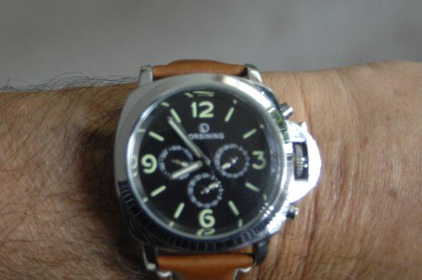 This watch has multiple complications, and is a clone for a much more expensive Panerai Luminor