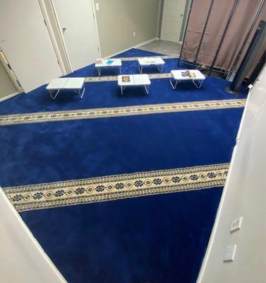 Women's prayer hall with newly added carpets. With a restroom and wudhu facility