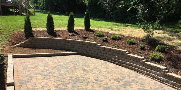 Our experienced team can build multifunctional retaining walls to fortify and beautify your landscape.