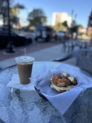 Power protein sandwich on jalapeño cheddar bagel and iced coffee