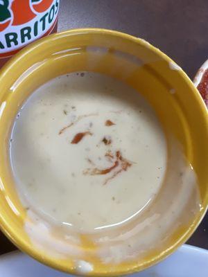 Cheese dip with a salsa smile