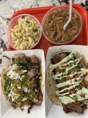 Brisket and carnitas with beans and Mac and cheese