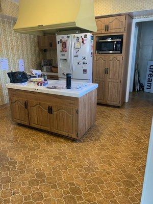 The ugly kitchen floor before