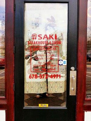 SAKI'S STEAKHOUSE & SUSHI exterior door in Griffin, GA.