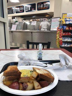 Spinach, feta cheese omlette, home fries and toast