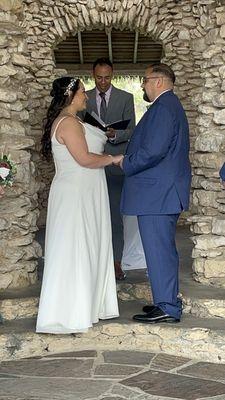 Husband and I with our Officiant for the ceremony