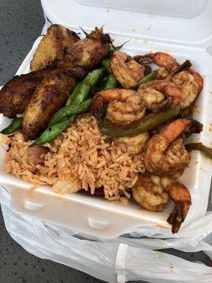 Jambalaya rice, green beans, shrimp/peppers, and plantains - amazing!!!