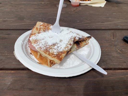 Giant crepes! This is the Full Monte: turkey, ham, Swiss, berry jam, and powdered sugar