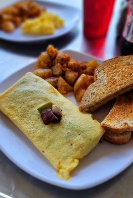 Eternal Sunshine Omelet with added 'shrooms; home fries; wheat toast